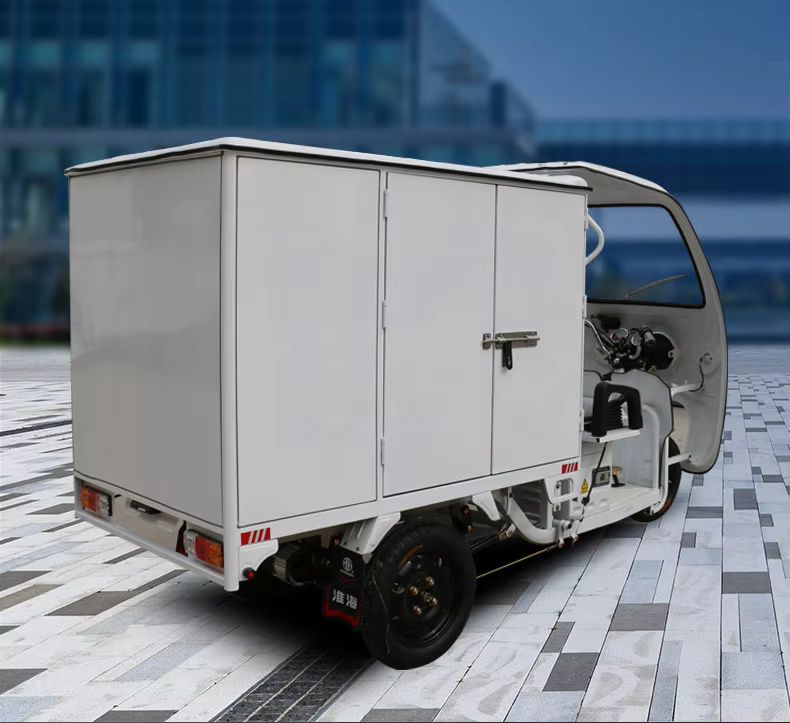 Efficient Semi-Enclosed Electric Tricycle for Cargo Transport Solutions 2